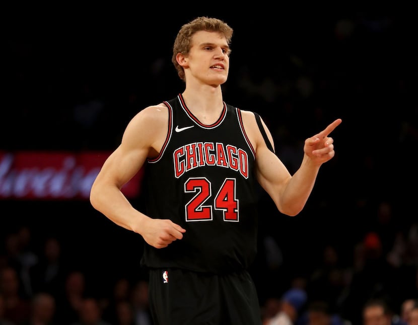 NEW YORK, NY - JANUARY 10:  Lauri Markkanen #24 of the Chicago Bulls celebrates his three...