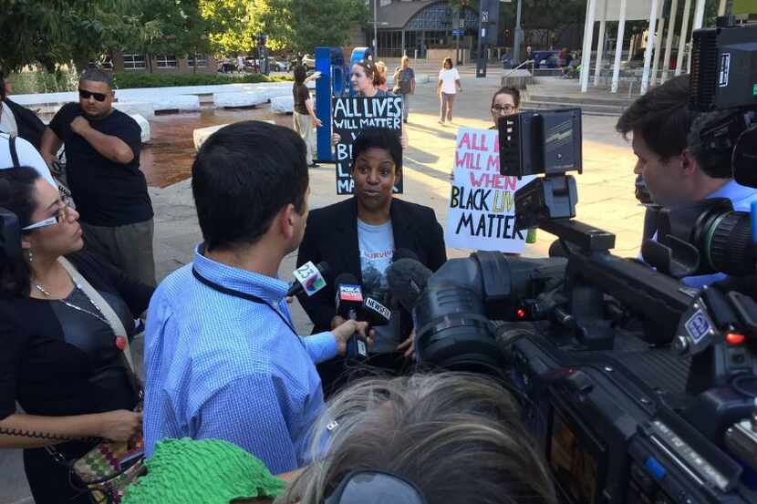 Protester Kim Cole addressed the media at a downtown Dallas demonstration organized by the...