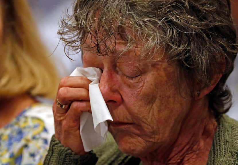 Carla Bardwell, mother of Jessie Bardwell, wipes tears as Judge Scott Becker reads the...