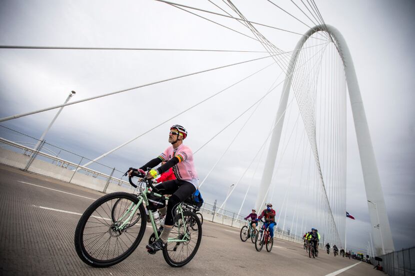 Cyclists cross the Margaret Hunt Hill Bridge at the beginning of the 2017 Dallas Gravel Ride...