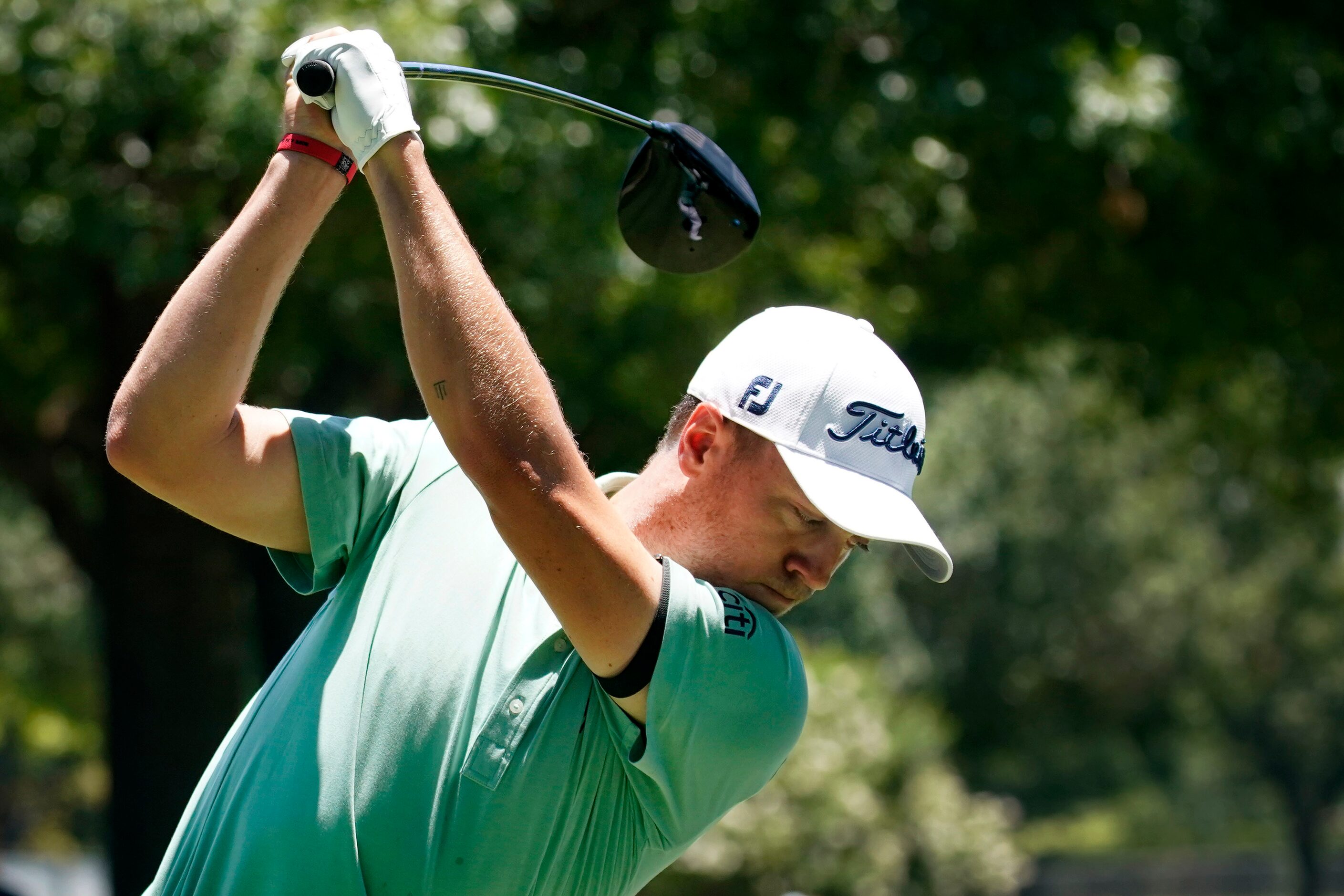 PGA Tour golfer Justin Thomas uses a driver off the 3rd tee box during the final round of...