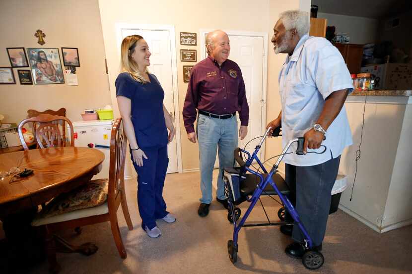Meals on Wheels recipient George Kelley visited with Abby Tupper and her father Charlie...