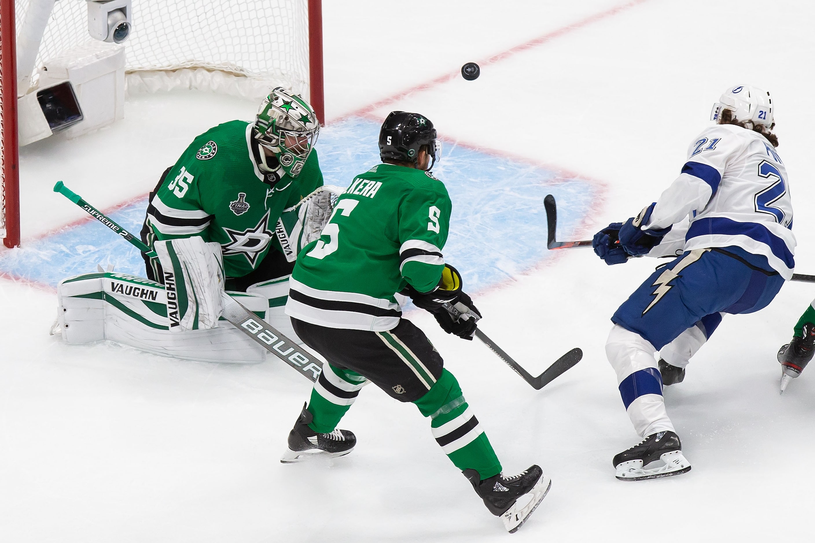 Goaltender Anton Khudobin (35) of the Dallas Stars can't stop Brayden Point (21) of the...