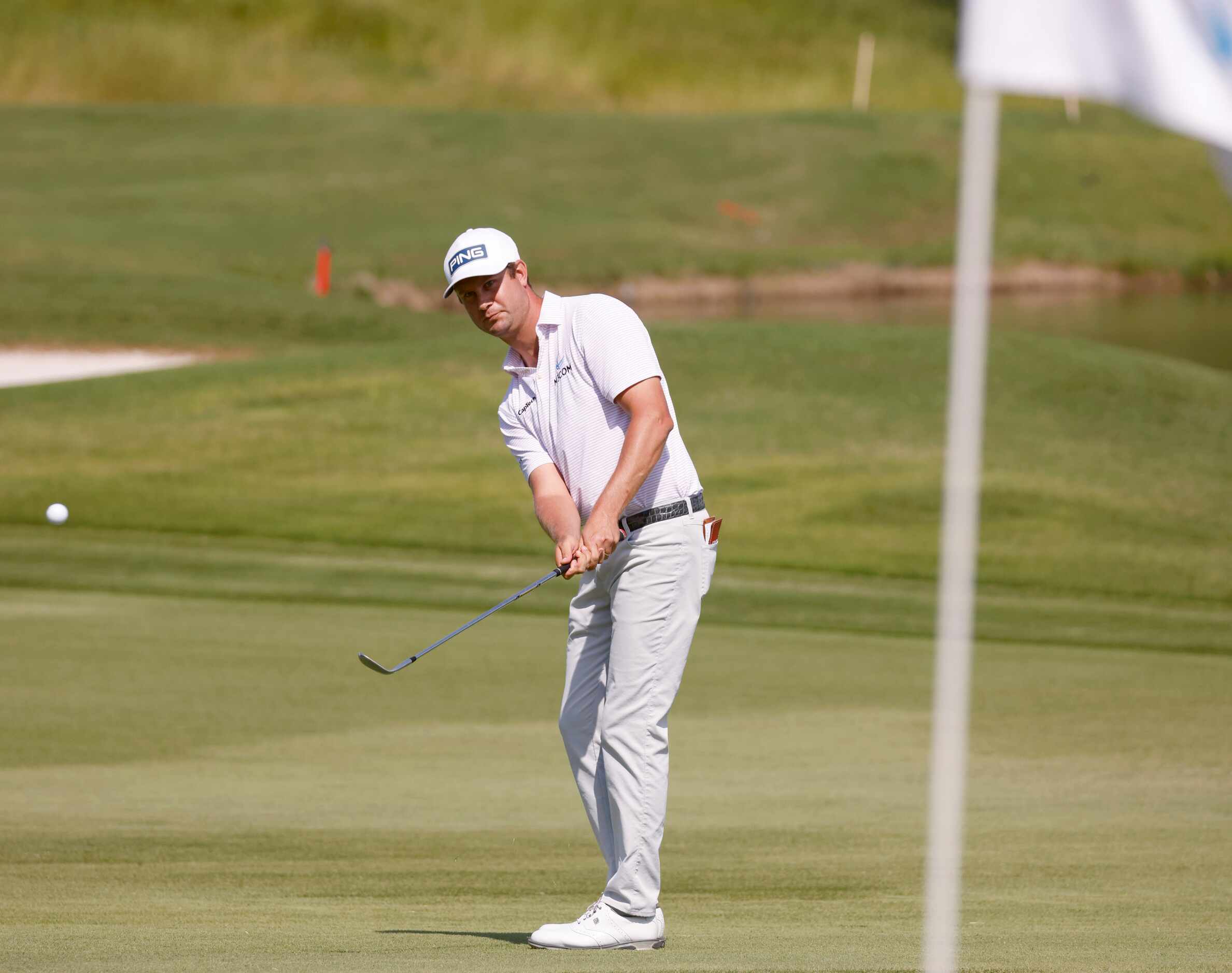 Harris English watches his ball on the 14th hole during round 3 of the AT&T Byron Nelson  at...