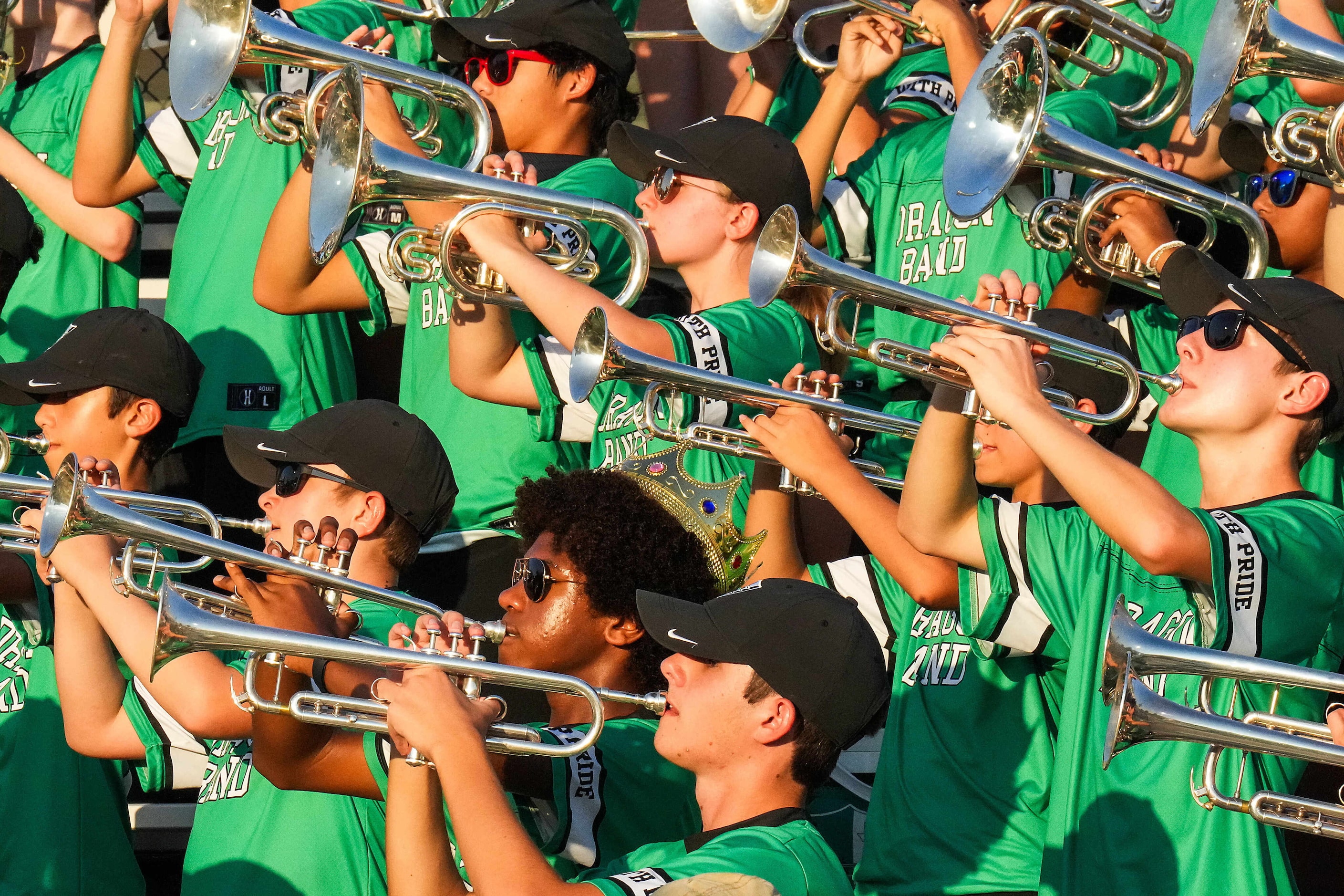 The Southlake Carroll band plays the school song  before a District 4-6A high school...