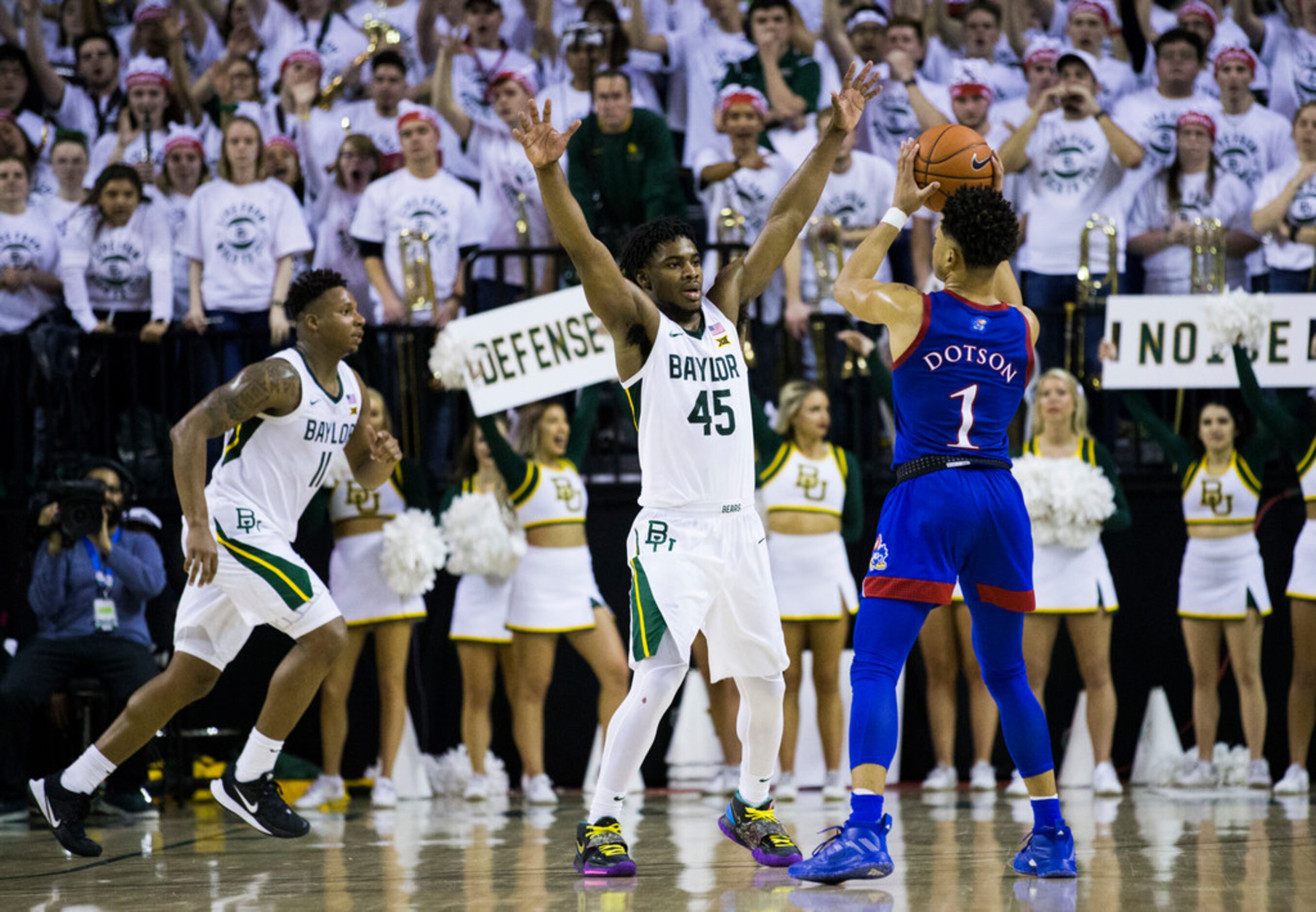 Baylor Bears guard Davion Mitchell (45) defends against Kansas Jayhawks guard Devon Dotson...