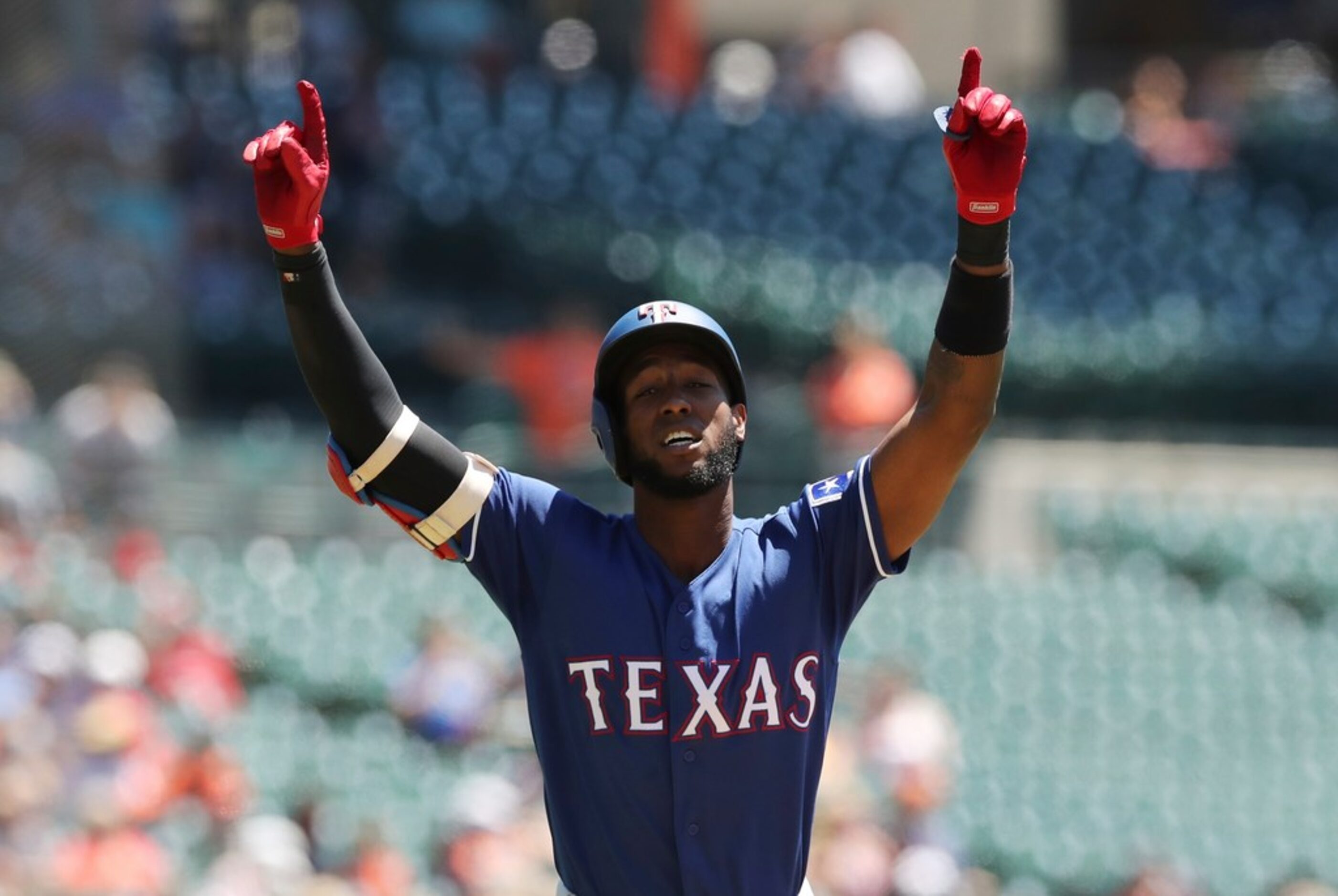 Texas Rangers' Jurickson Profar rounds the bases after a solo home run during the first...