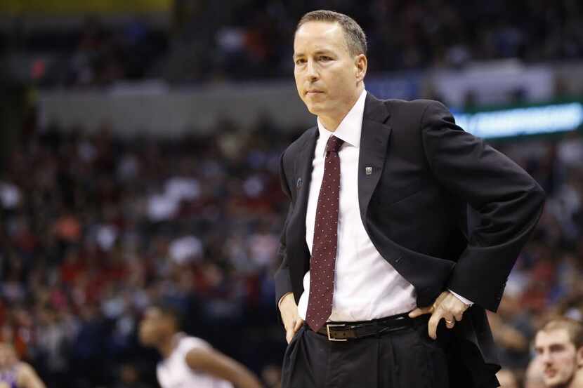 Texas A&M Aggies head coach Billy Kennedy stares in the referee's direction after a no call...