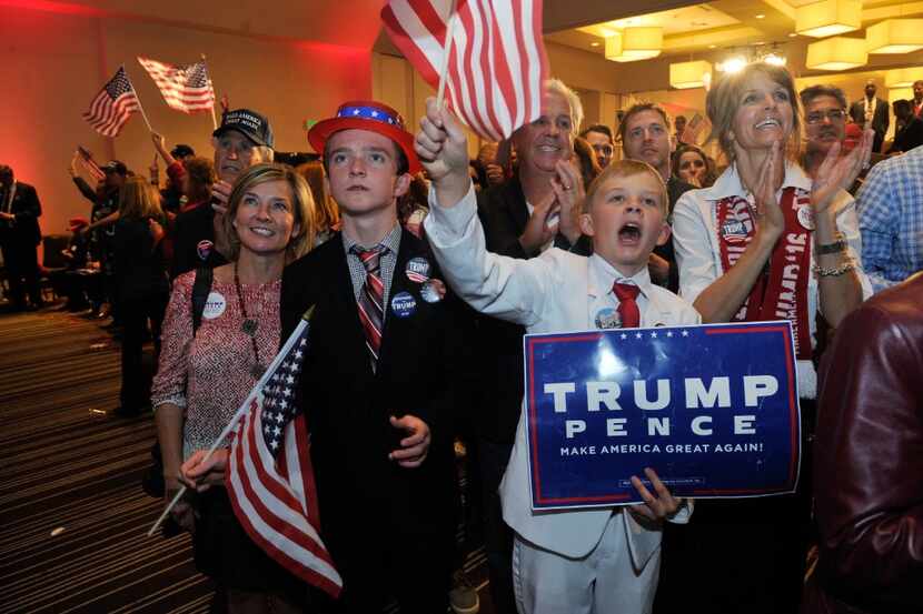 Supporters of Donald Trump celebrated his victory at an election night party in Greenwood...