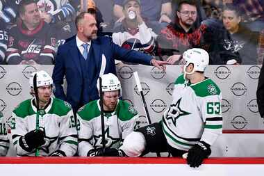 Dallas Stars head coach Pete DeBoer instructs players against the Winnipeg Jets during the...