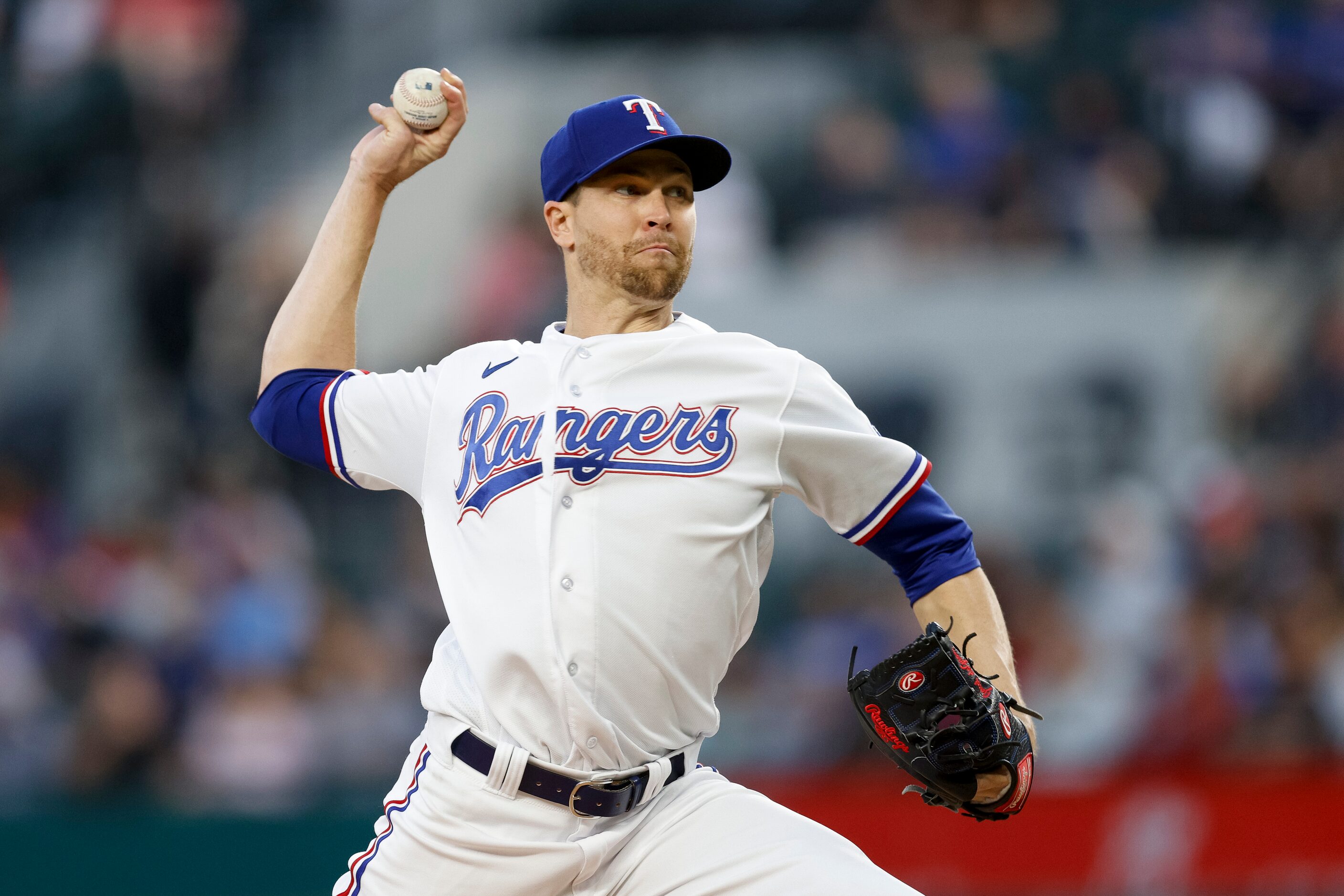 Texas Rangers starting pitcher Jacob deGrom (48) delivers a pitch during the third inning of...