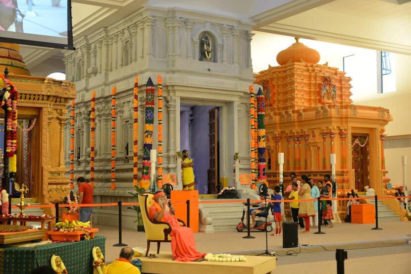 
Sri Ganapathy Sachchidananda Swamiji from India watched opening activities at the Karya...