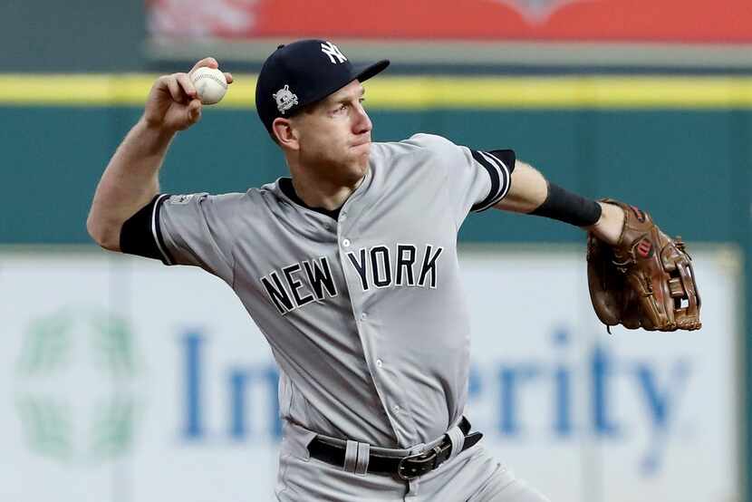 HOUSTON, TX - OCTOBER 21:  Todd Frazier #29 of the New York Yankees fields a hit by George...