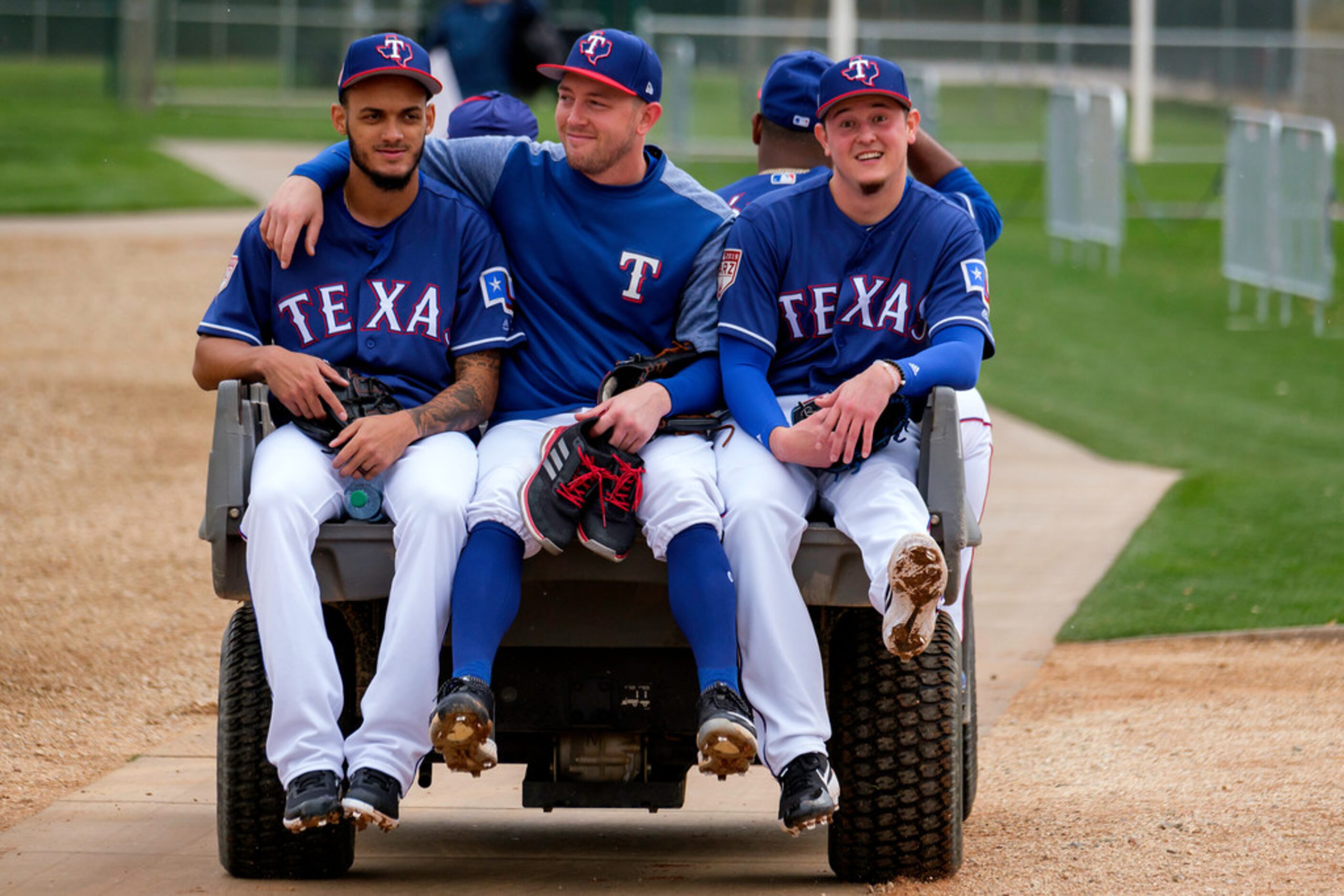 Texas Rangers pitchers (from left) Jonathan Hernandez, Adrian Sampson and Nick Gardewine...