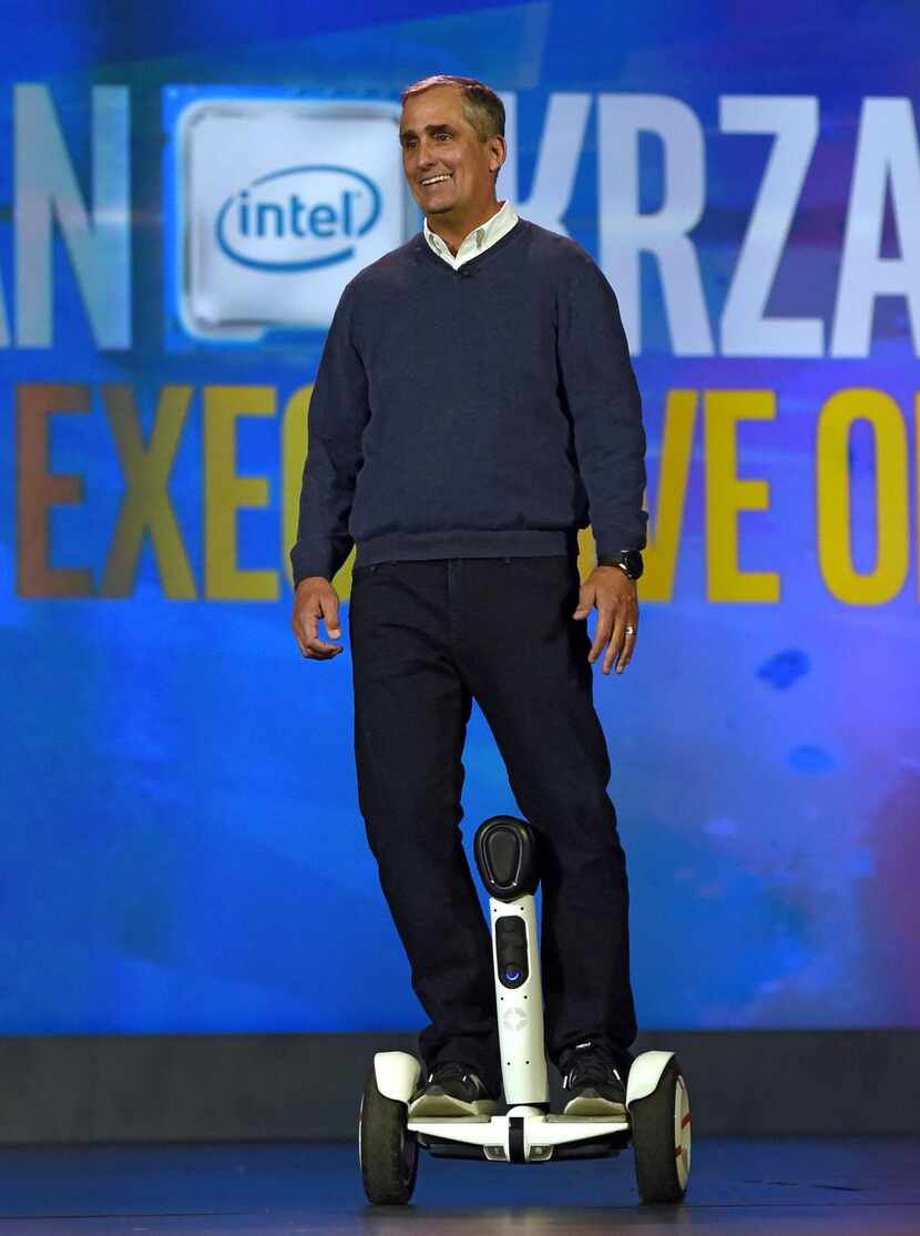 
Intel CEO Brian Krzanich arrives at his keynote address riding a self-balancing Ninebot...