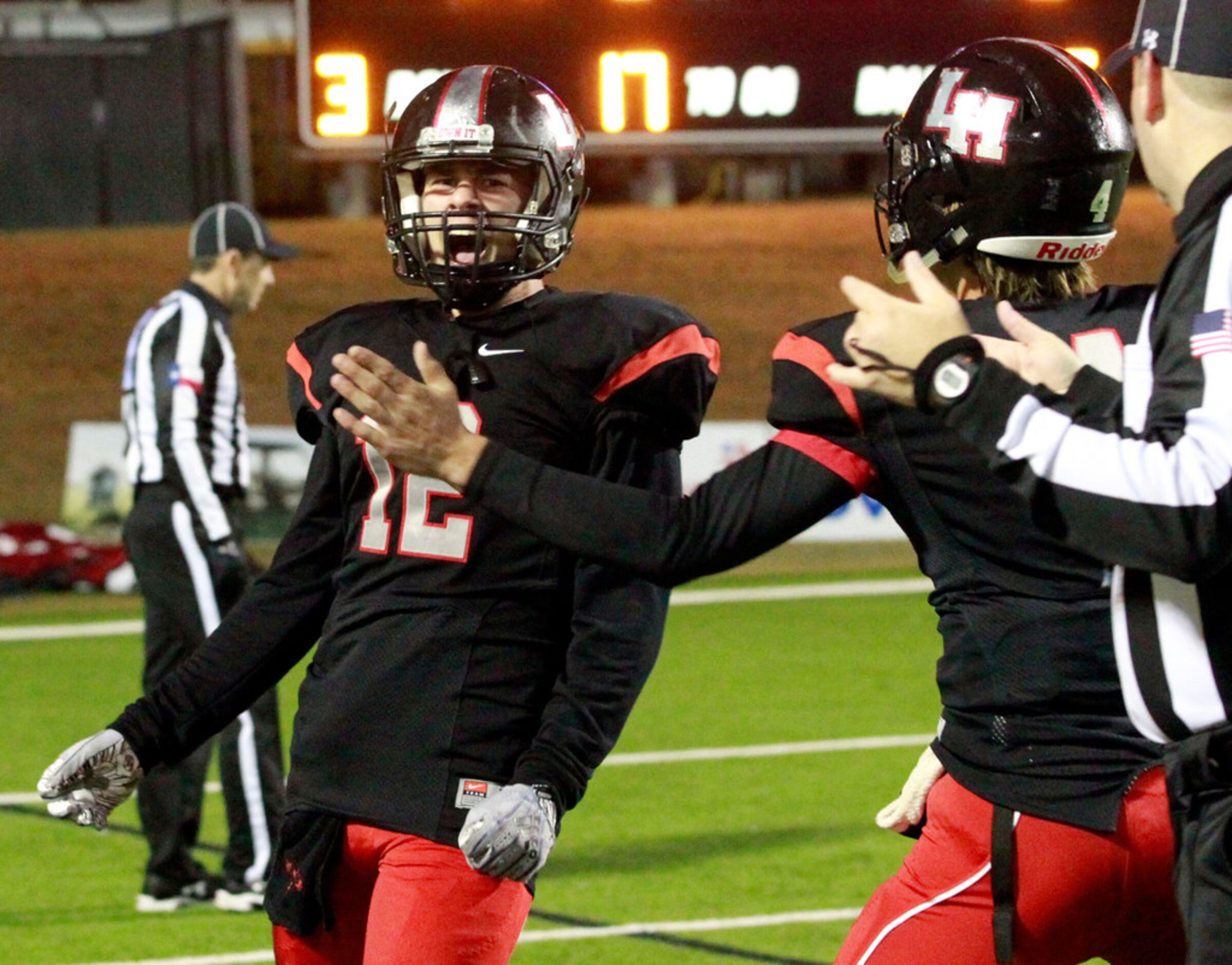 Lake Highlands defender Jacob Thomson (12) screams after returning an interception for a...