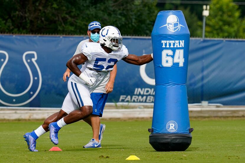 Indianapolis Colts defensive end Ben Banogu (52) runs a drill during practice at the NFL...