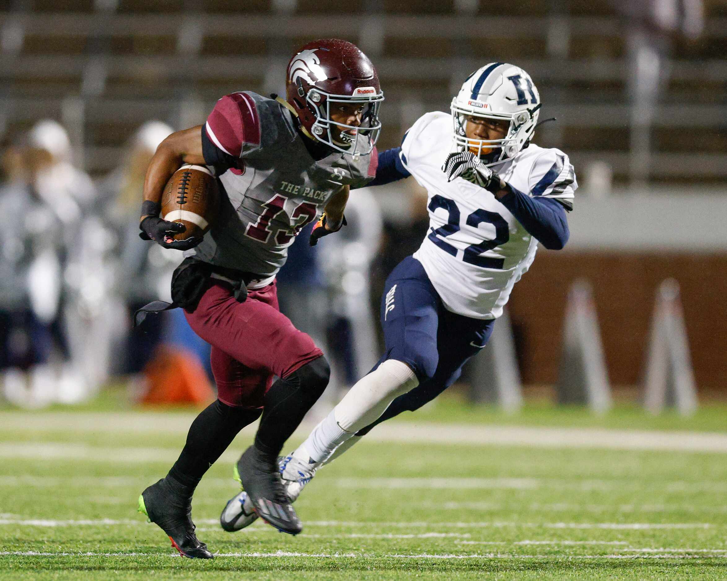 Mansfield Timberview wide receiver Tyler Madison (13) races past Richland defensive back...