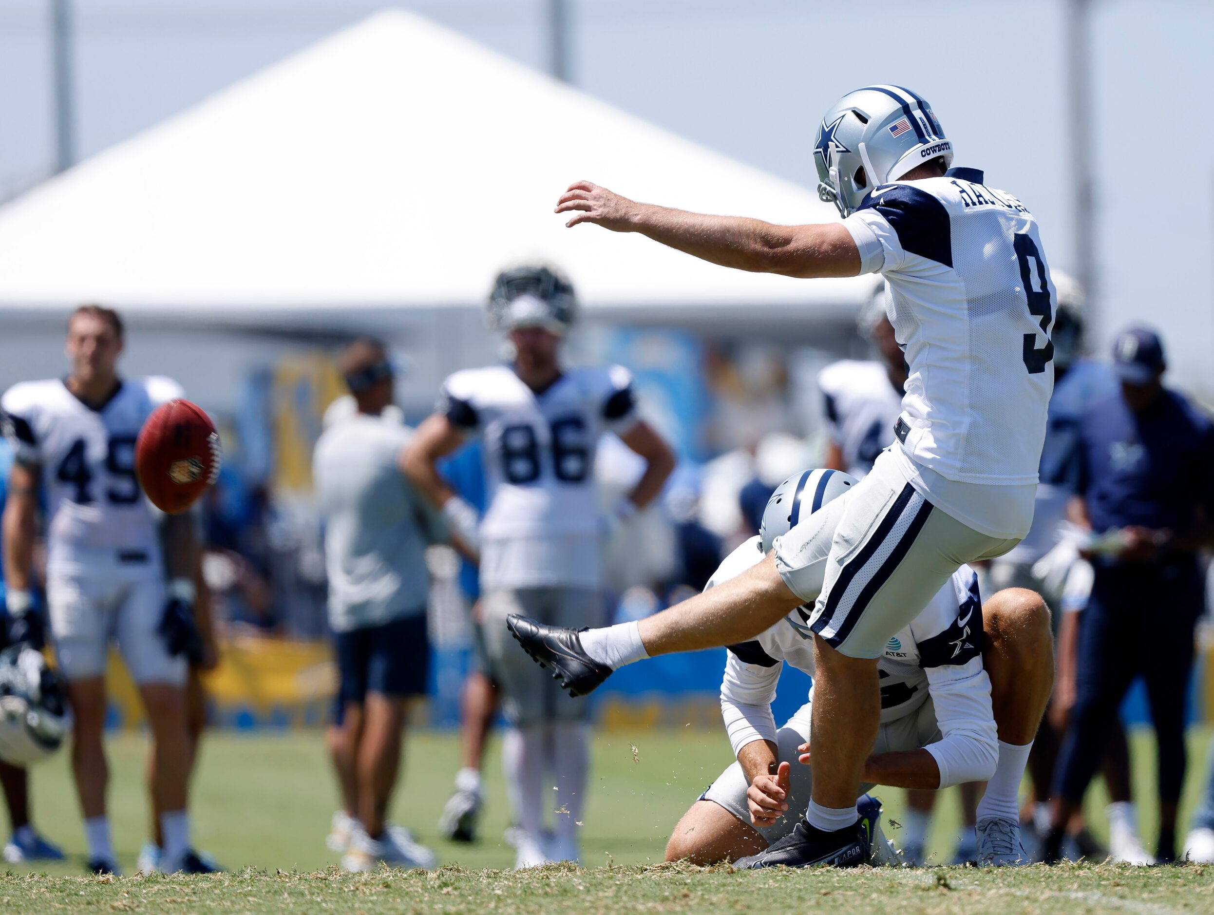 Dallas Cowboys place kicker Lirim Hajrullahu (9) follows through on a field goal attempt...