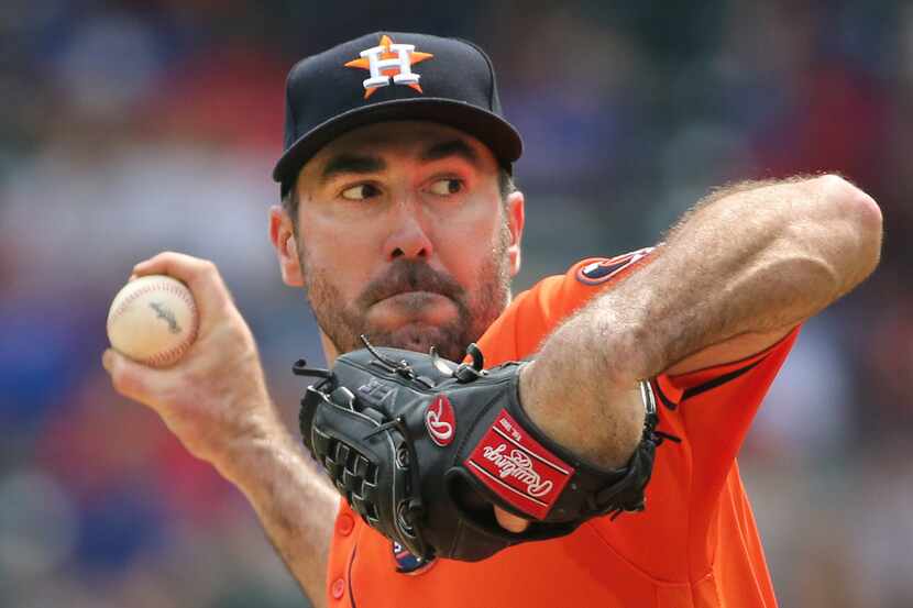 Houston Astros starting pitcher Justin Verlander (35) throws a third inning pitch during the...