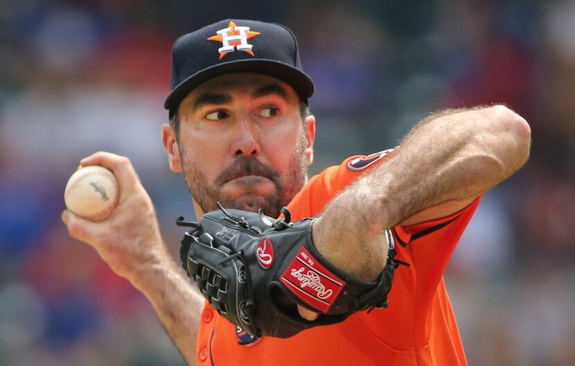 Houston Astros starting pitcher Justin Verlander (35) throws a third inning pitch during the...