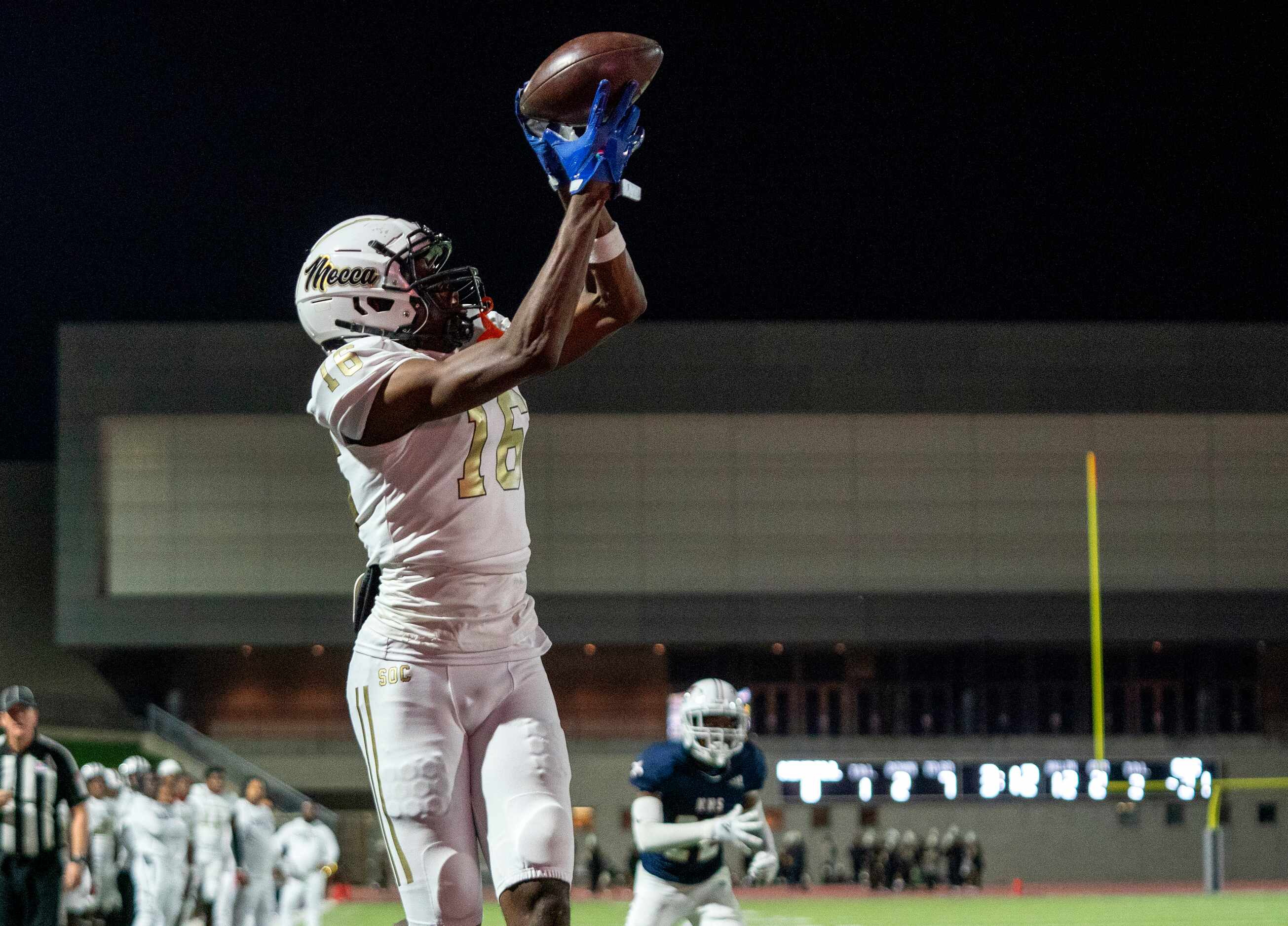 South Oak Cliff junior wide receiver Trey Jackson (16) hauls in a touchdown pass during the...
