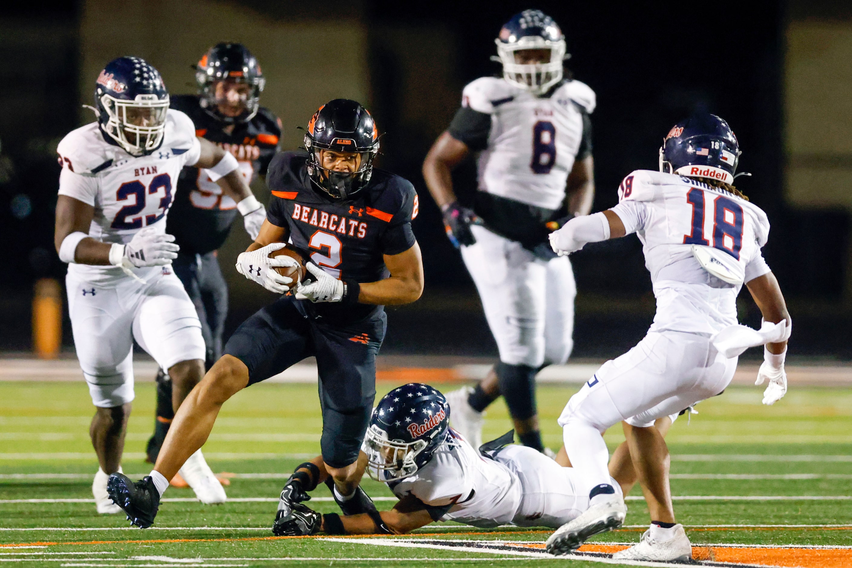 Aledo wide receiver Kaydon Finley (2) runs the ball as Denton Ryan defensive back Jaxson...