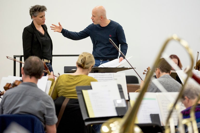 Italian maestro Carlo Montanaro works with Alexandra Cravero as she conducts the Dallas...