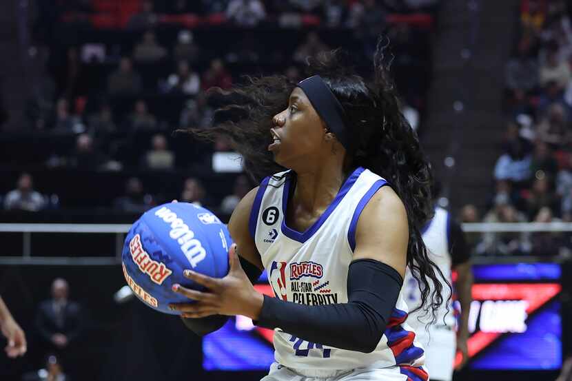 WNBA basketball All-Star and Dallas Wings' Arike Ogunbowale shoots the ball in the second...