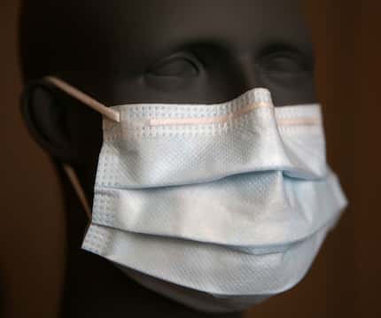 A surgical ear loop mask photographed at the Prestige Ameritech manufacturing plant in North...