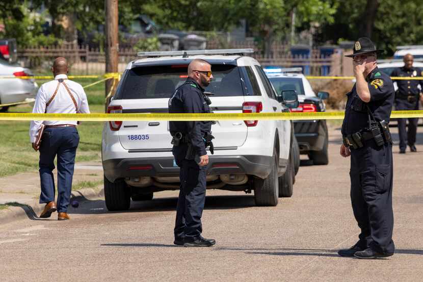 Dallas police respond to a stabbing in the 2900 block of Frazier Street on Thursday.