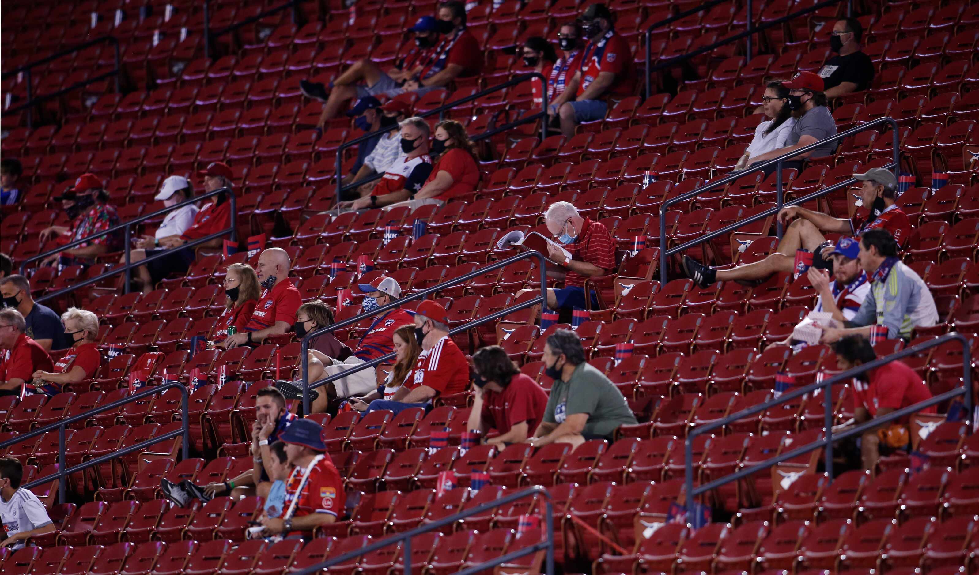 FC Dallas fans practice social distancing during first half action between FC Dallas and...