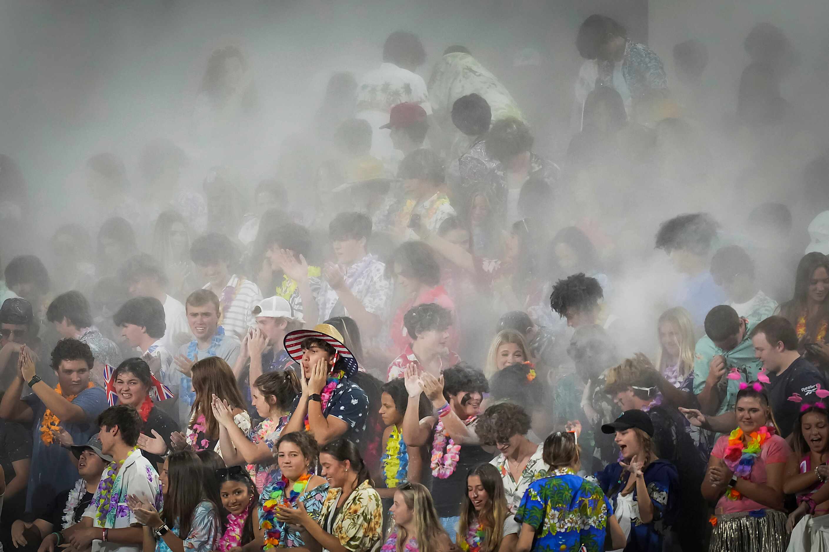 Baby powder flies as Denton Guyer students celebrate in the final minutes of the second half...