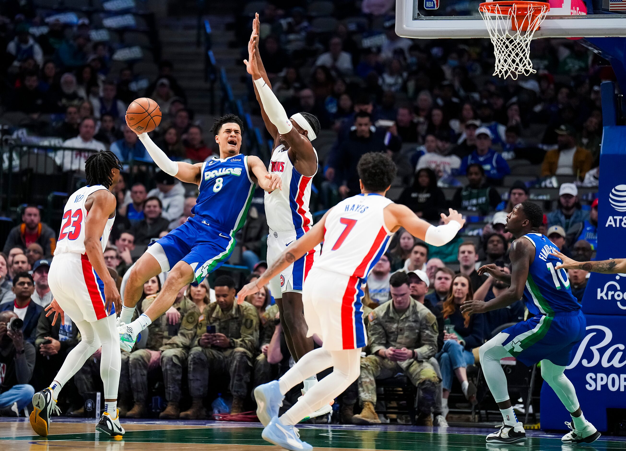 Dallas Mavericks guard Josh Green (8) passes the ball as Detroit Pistons center Jalen Duren...