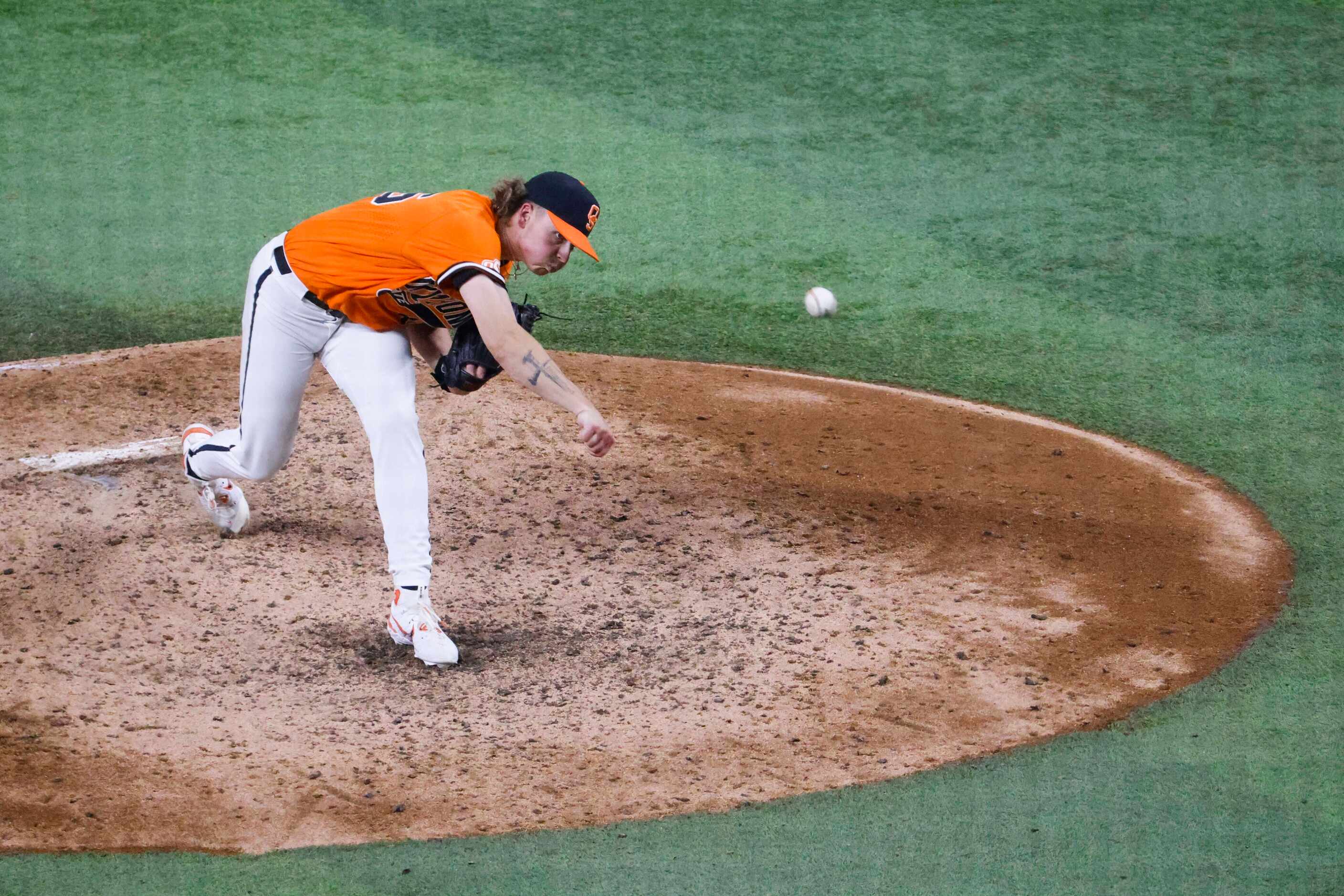 Oklahoma St. pitcher Dominick Reid throws during the fifth inning of Big 12 baseball...