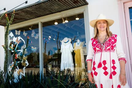 Owner Carley Seale poses at Favor The Kind store in Dallas. She and her staff added an...