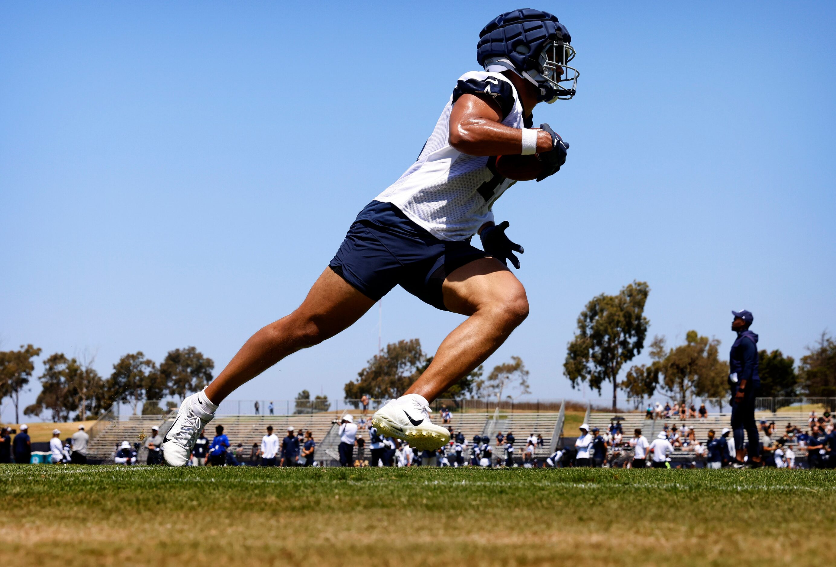 Dallas Cowboys tight end Berwyn Spann-Ford (47) turns up field after catching a pass during...