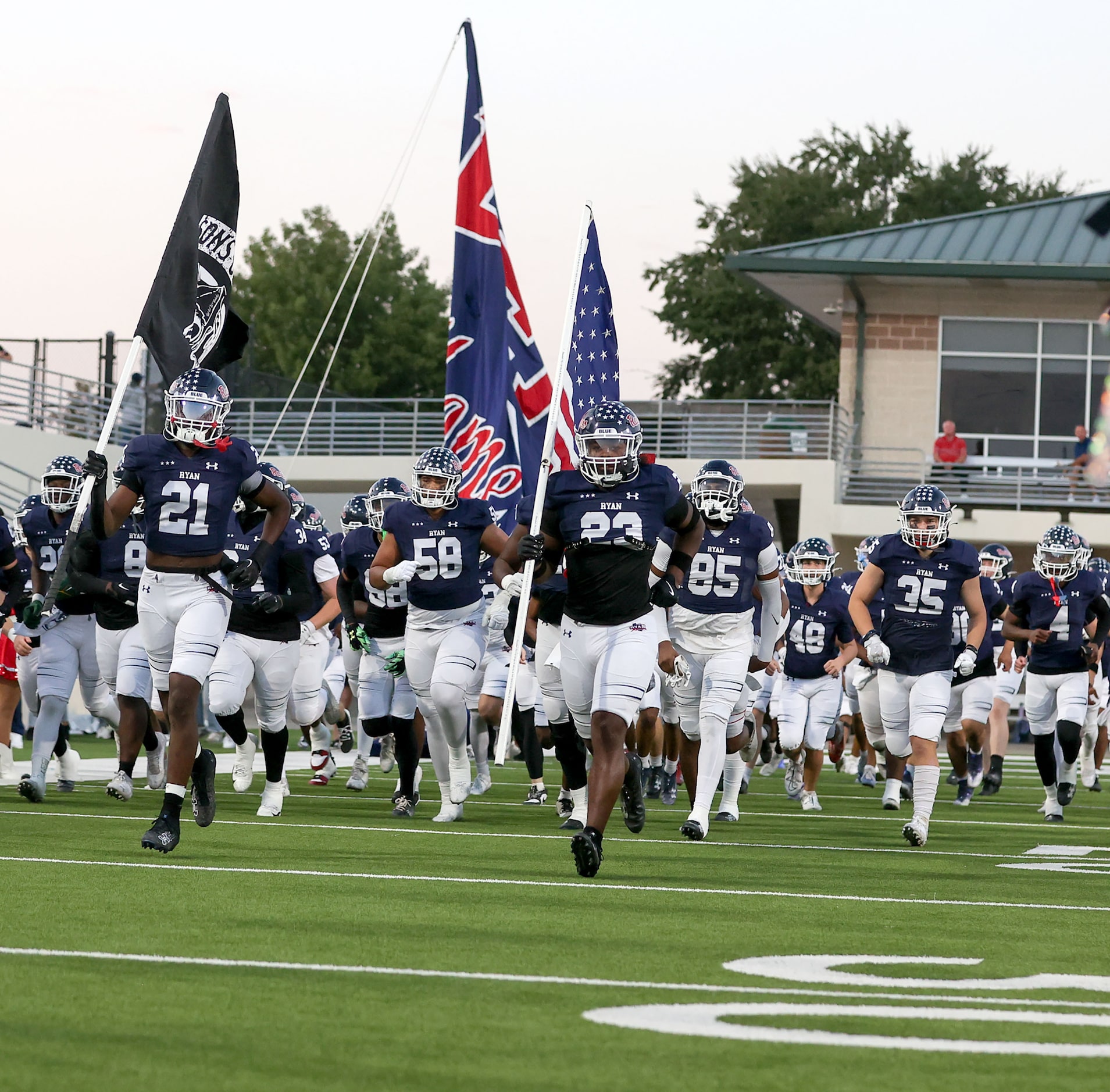 The Denton Ryan Raiders enter the field to face Richland in a District 3-5A Division I high...