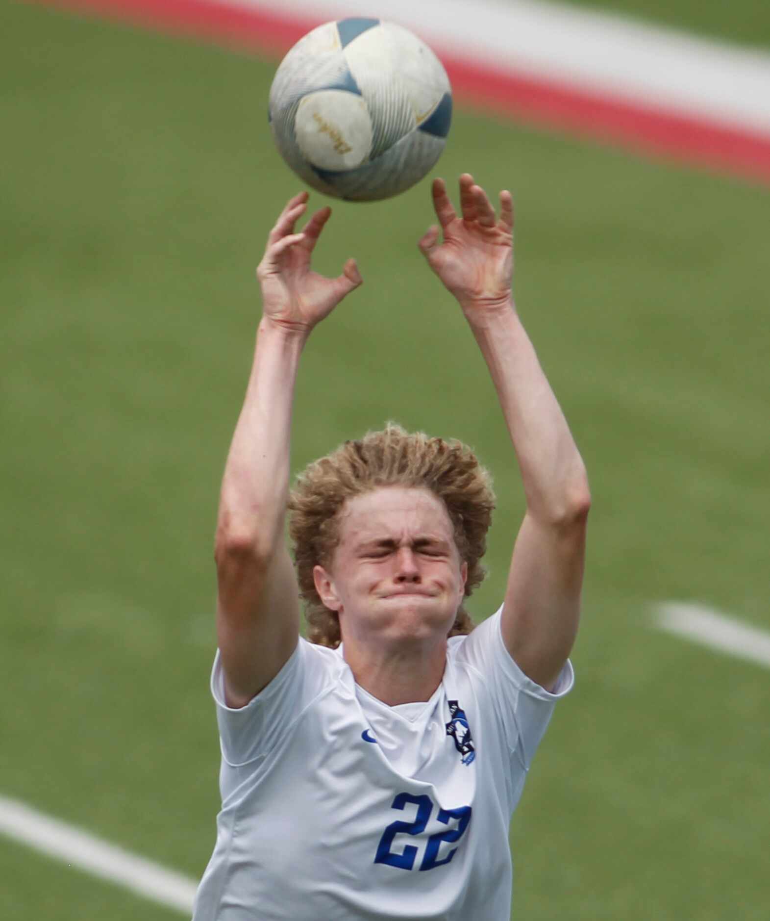 Midlothian defenseman Wesley McCool-Jones (22) launches a long "throw in" during first half...