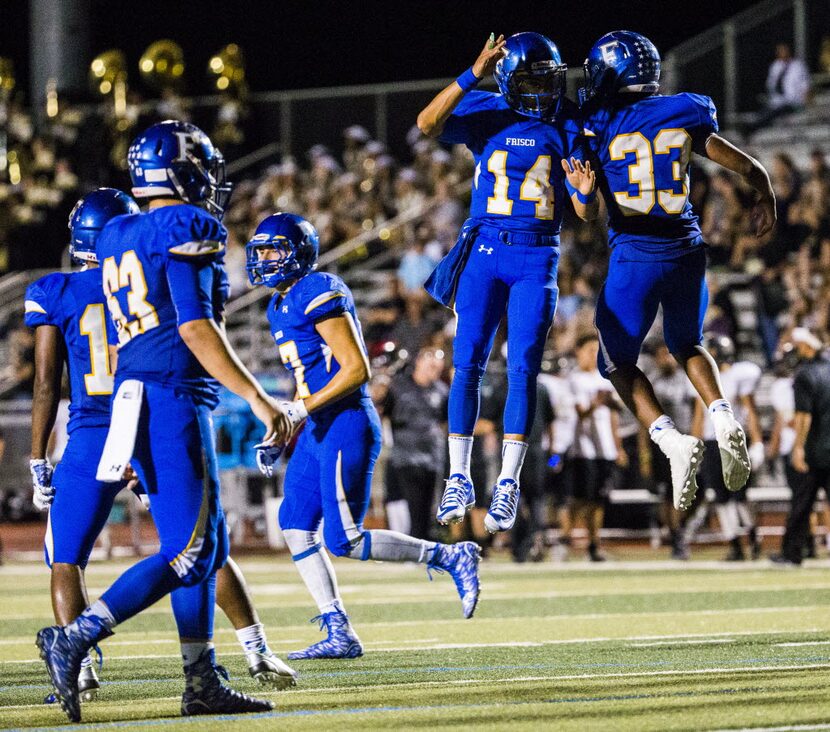 Frisco fullback Idrees Ali (33) celebrates with quarterback Rohan Vasa (14) after Idrees...