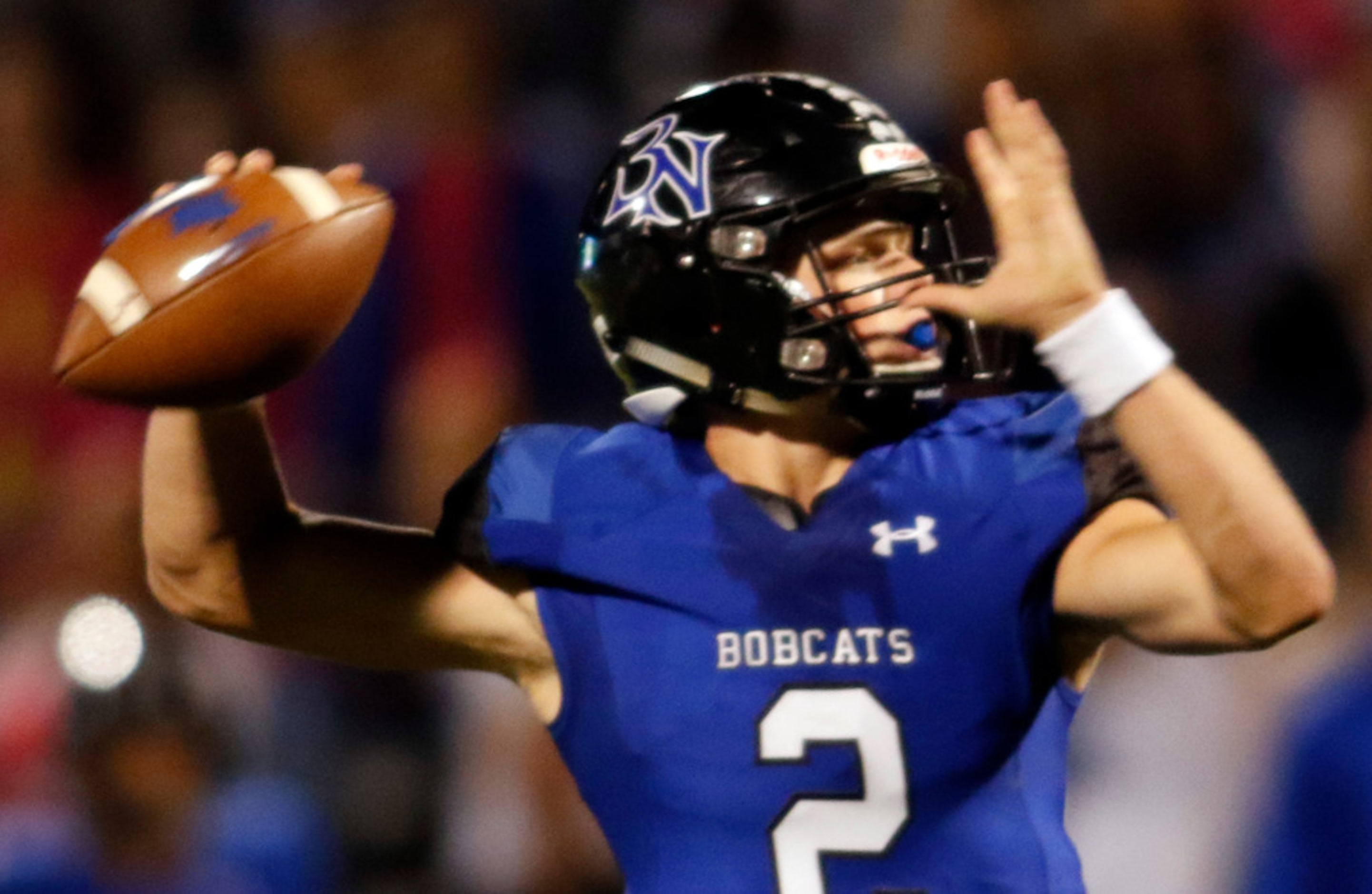 Trophy Club Byron Nelson quarterback Hudson White (2) delivers a touchdown pass to receiver...