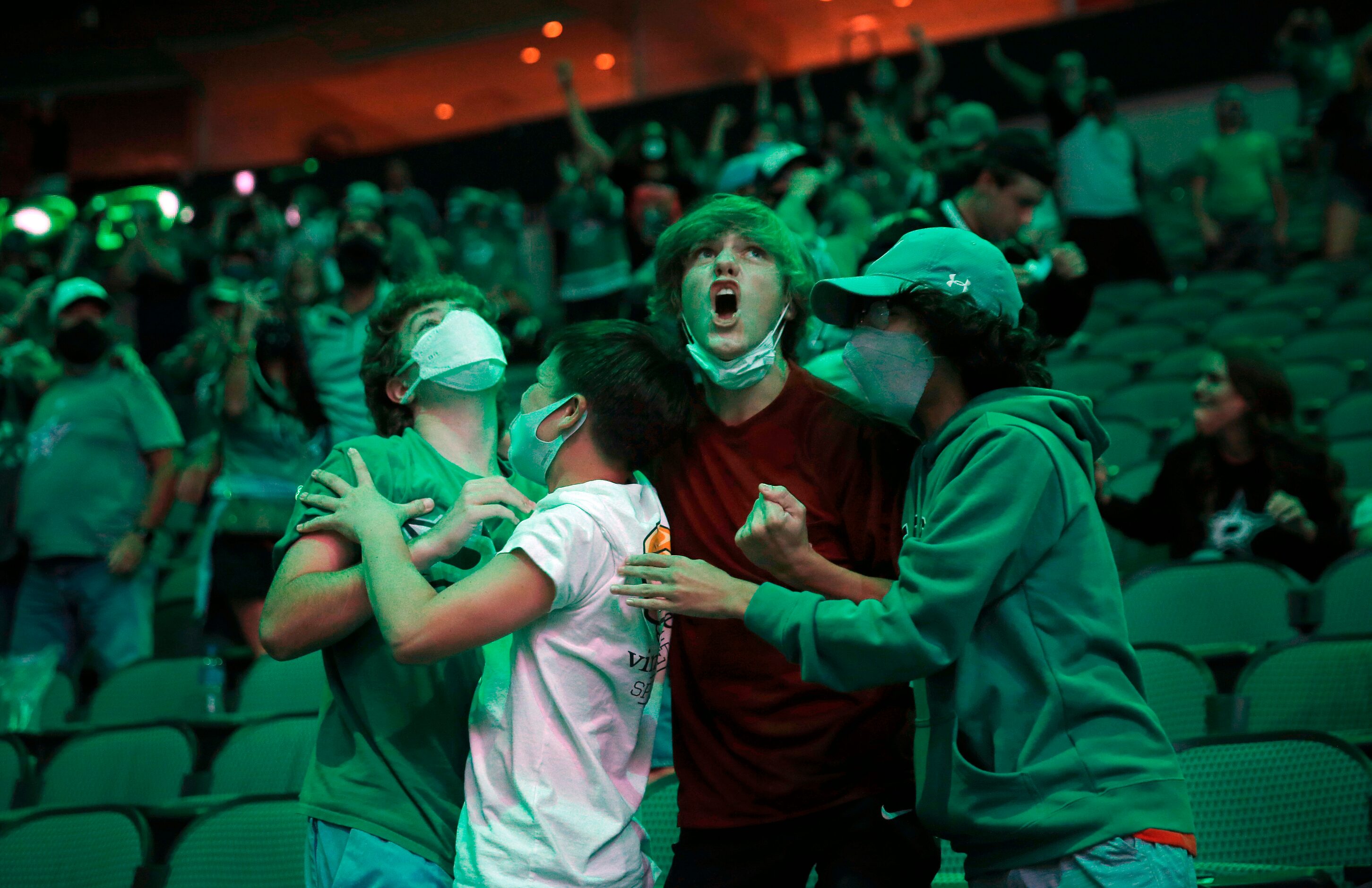 During a watch party at the American Airlines Center, Dallas Stars fans celebrate the Stars...