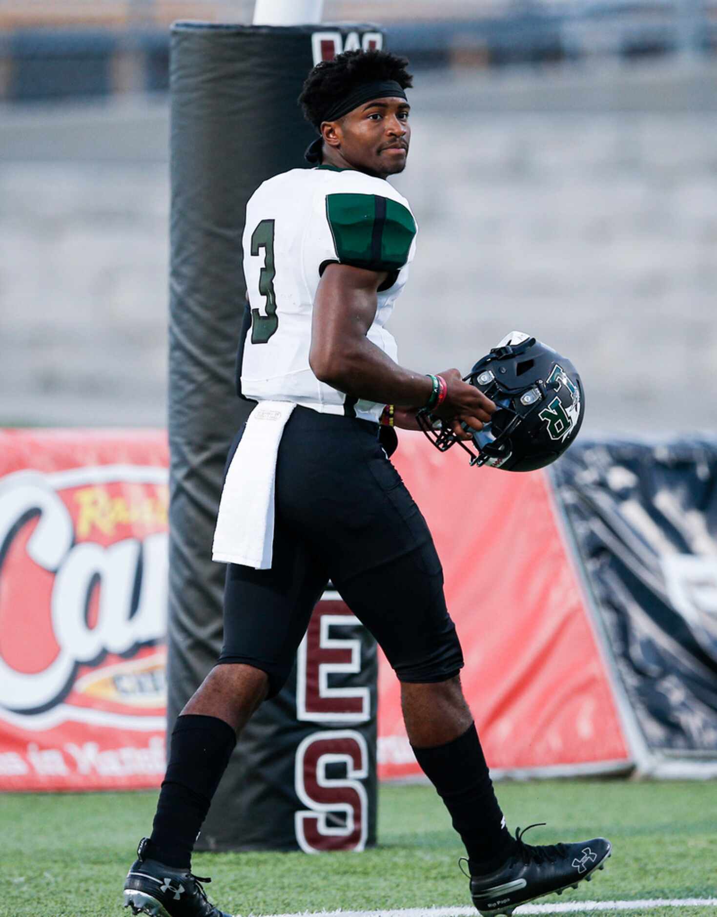 TXHSFB Mansfield Lake Ridge senior quarterback Adrian Hawkins (3) looks on before the start...