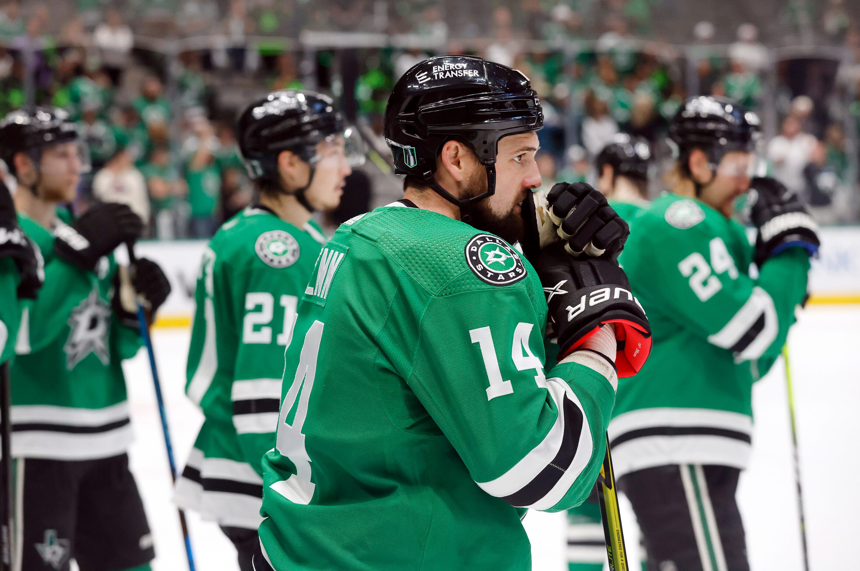 Dallas Stars left wing Jamie Benn (14) and his teammates, Jason Robertson (21) and Roope...