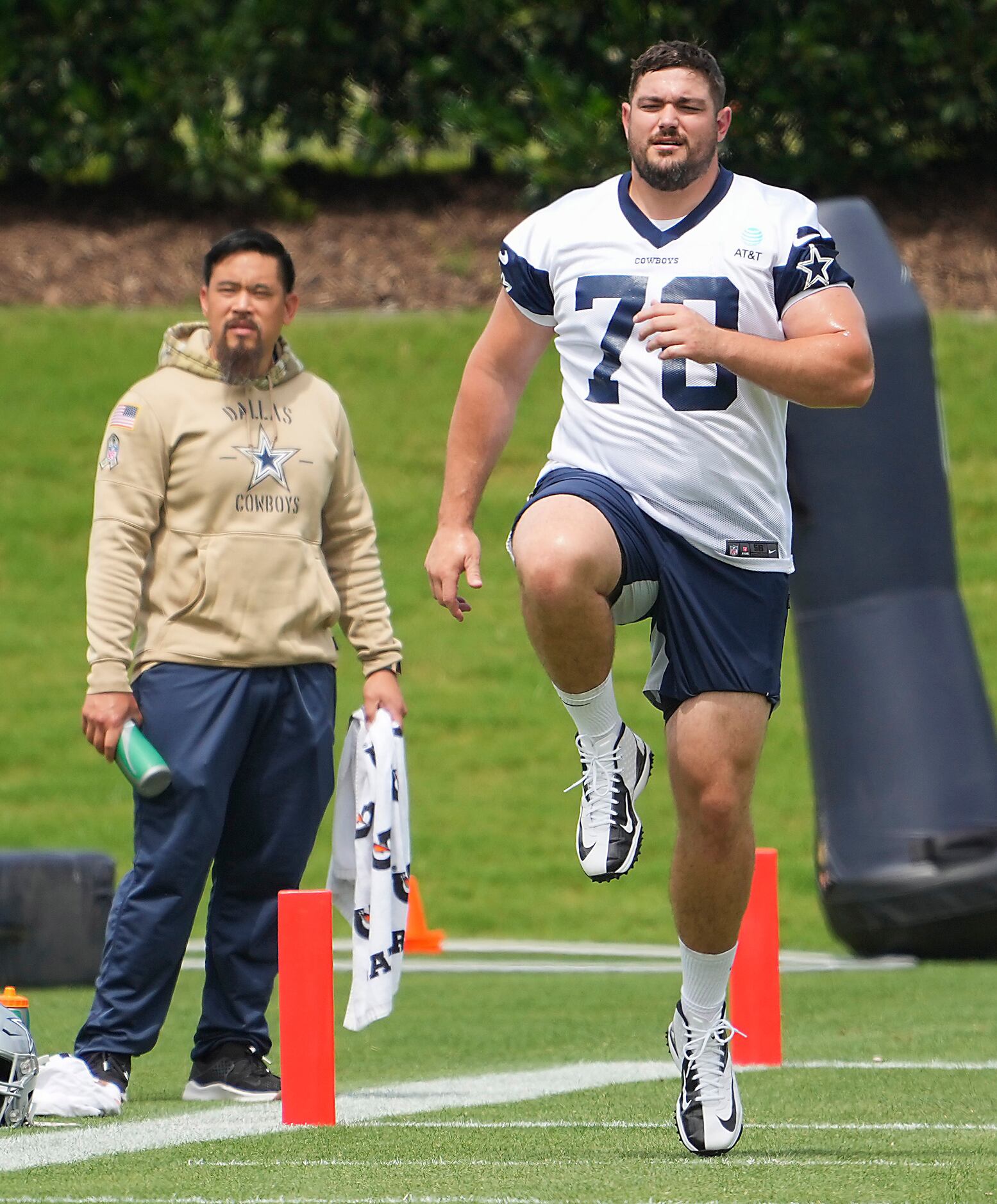 Dallas Cowboys guard Zack Martin (70) does conditioning during a minicamp practice at The...
