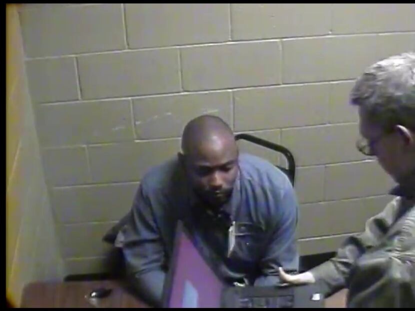 Sgt. James Young (right) brought in a laptop to show Michael Cunningham the surveillance...