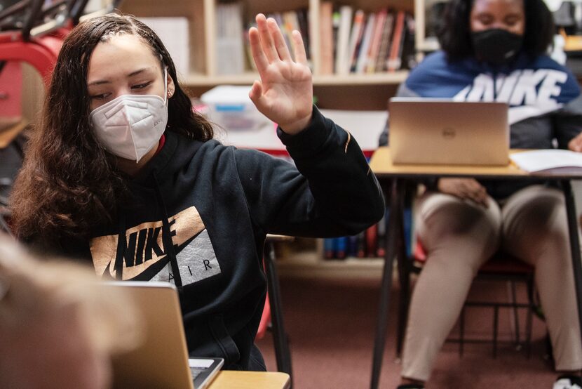 Eighth grader Yarettzi Chavez raised her hand to answer a question as her social studies...