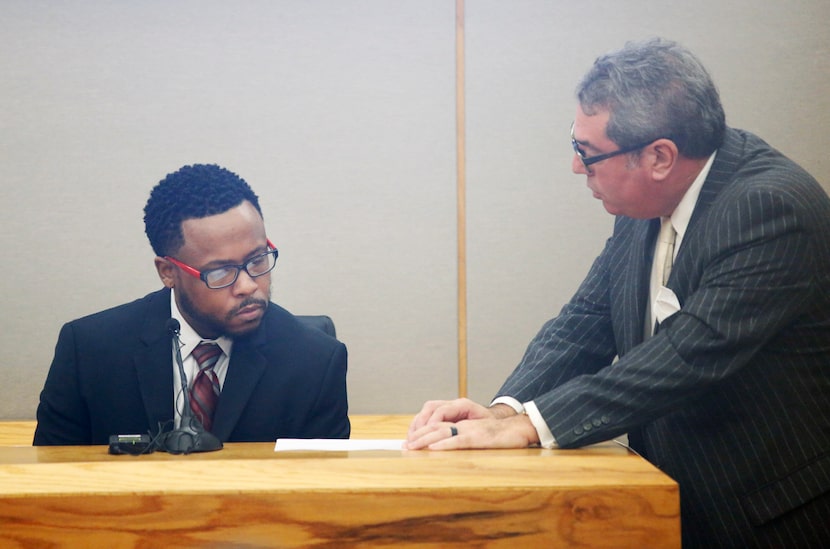 Ryan Crawford (left) answered questions from Heath Hyde while on the stand during a hearing...