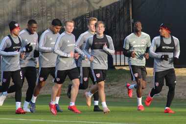 Front row, left to right: John Nelson, Paxton Pomykal, and Santiago Mosquera. Back row, left...