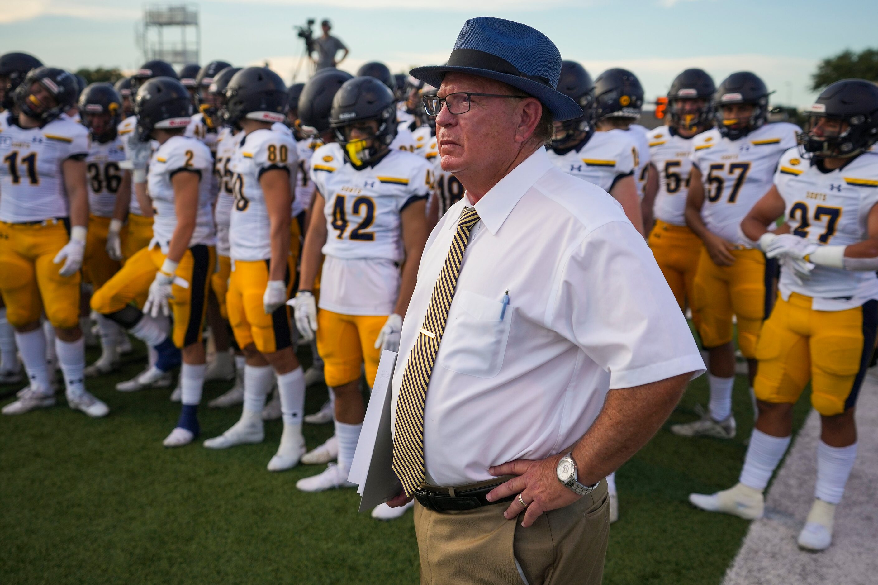 Highland Park head coach Randy Allen waits to take the field before a high school football...